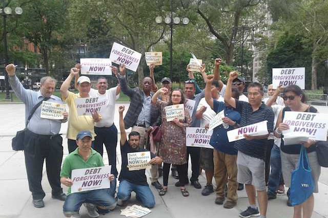 Members of the NY Taxi Workers Alliance in front of City Hall.